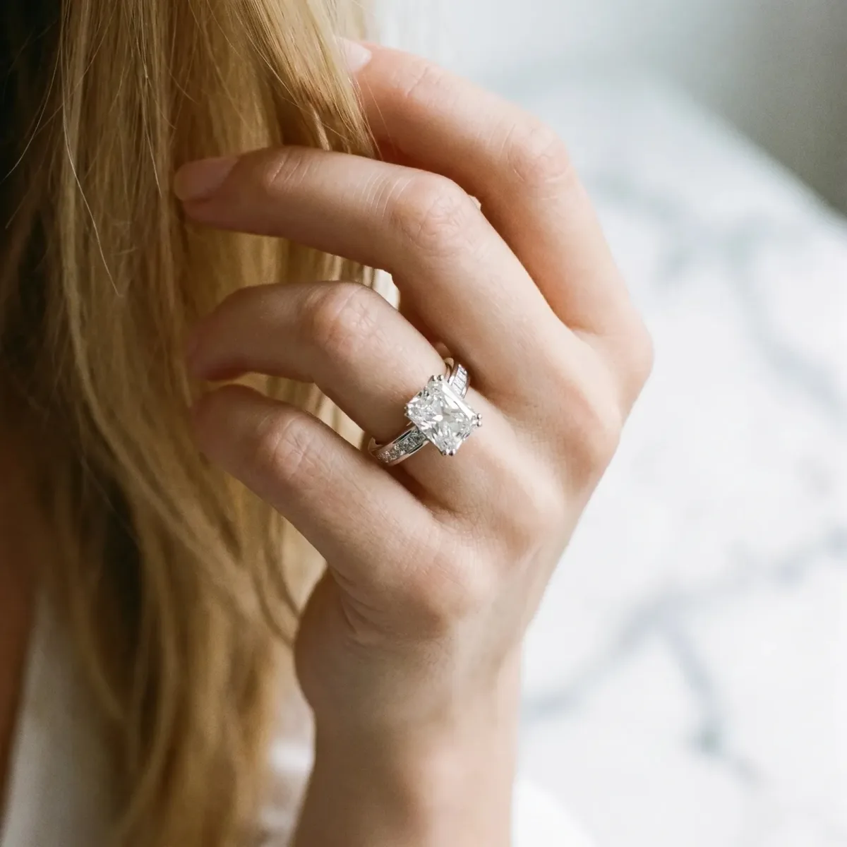 Radiant Cut Cut Channel Set Solitaire Engagement Ring with Prong Setting Platinum