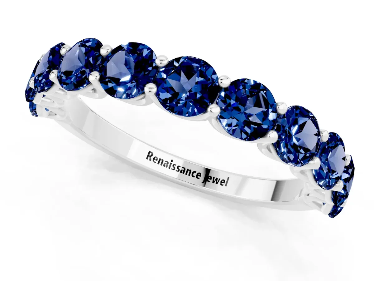 Round Blue Sapphire Shared Prong Eternity Band Silver
