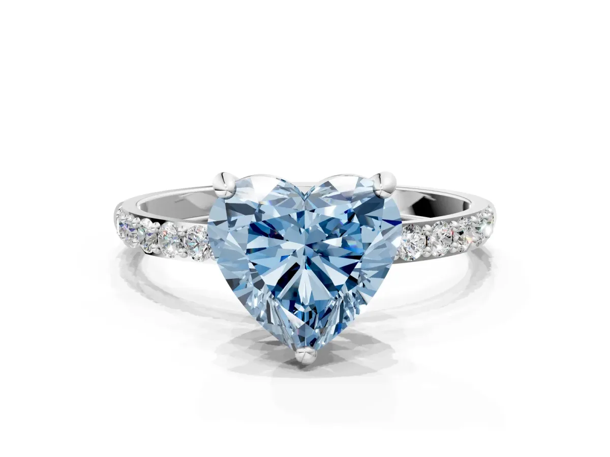 Fancy Blue Heart Cut Diamond Solitaire Ring with Round Pavé Band and Prong Setting Silver