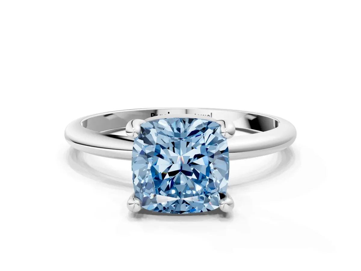 Fancy Blue Cushion Cut Solitaire Diamond Ring with 4-Prong Setting on a Classic Band Silver
