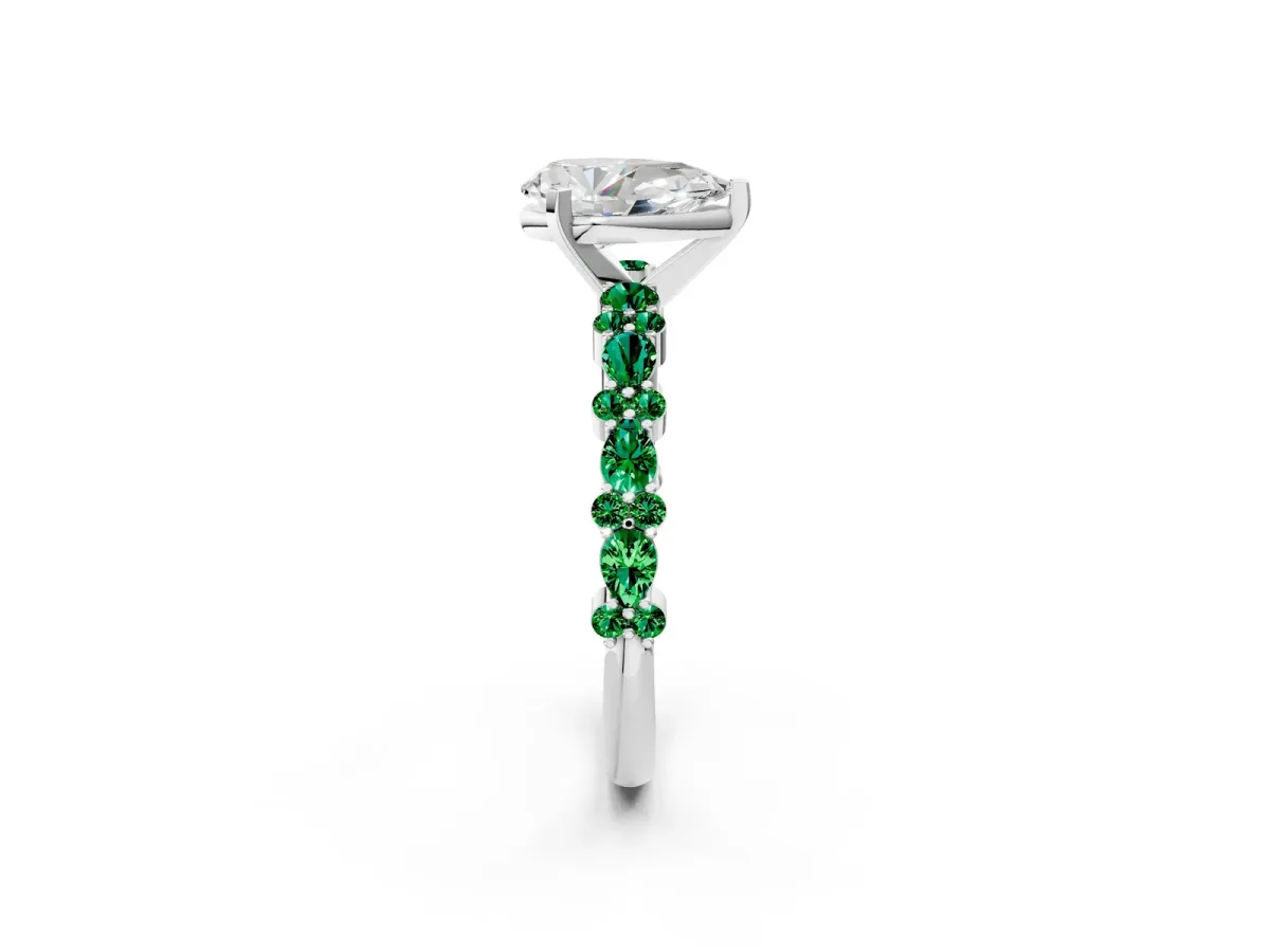 Pear Cut Diamond Side Stone Solitaire Ring with Round Emerald and Four-Prong Setting Silver
