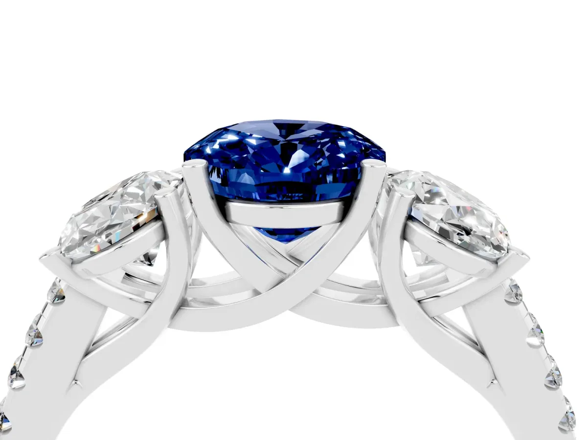 Three-Stone Oval Cut Blue Sapphire Ring with Round Pavé Band and Prong Setting Silver