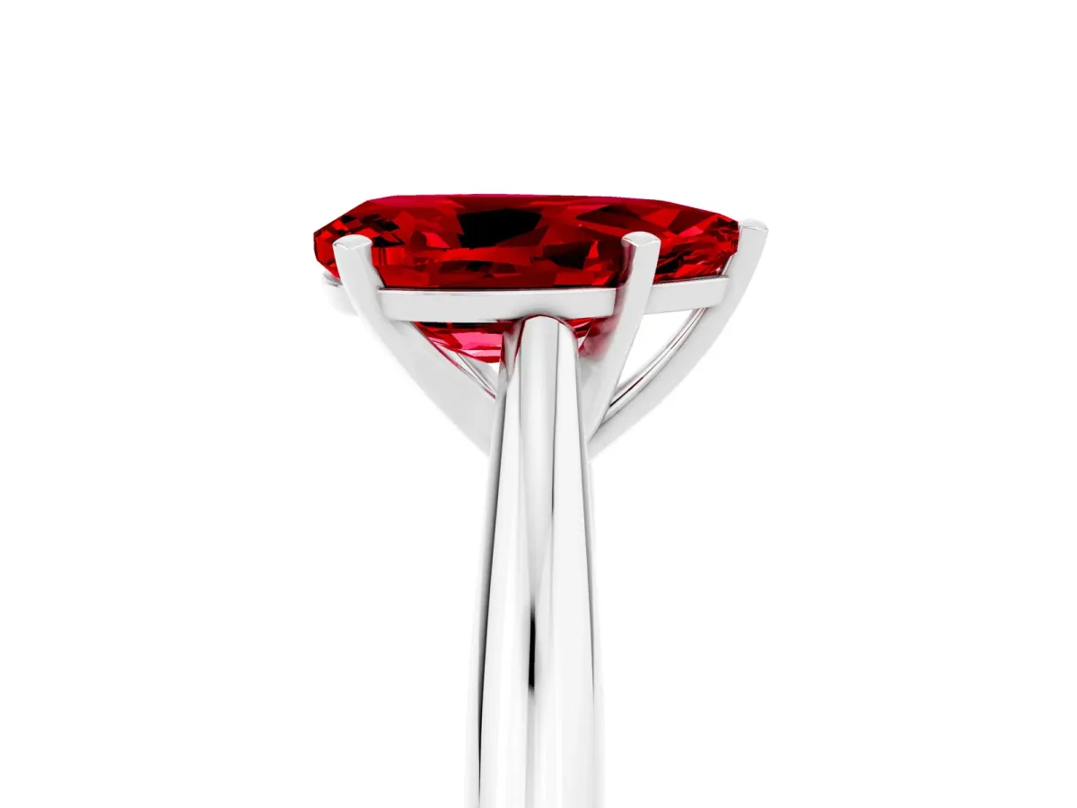 Pear Cut Ruby Solitaire Engagement Ring with Cathedral Setting and Four-Prong Mount White gold