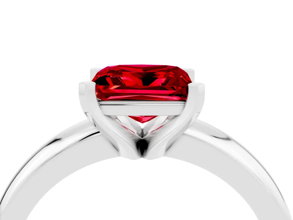Princess Cut Ruby Solitaire Engagement Ring with Round Band and Four-Prong Setting Silver