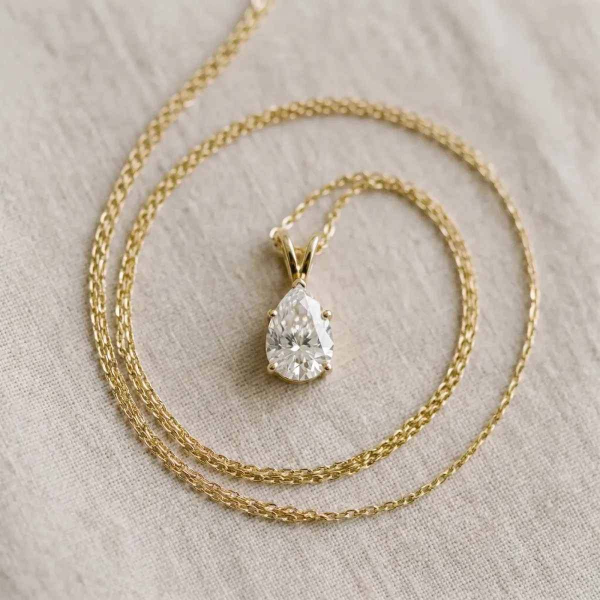 Pear Cut Solitaire Pendant with Three-Prong Setting Yellow gold