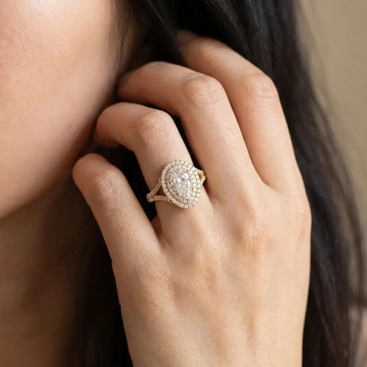 Pear Cut Diamond Double Halo Ring with Split Shank and Prong Setting Yellow gold