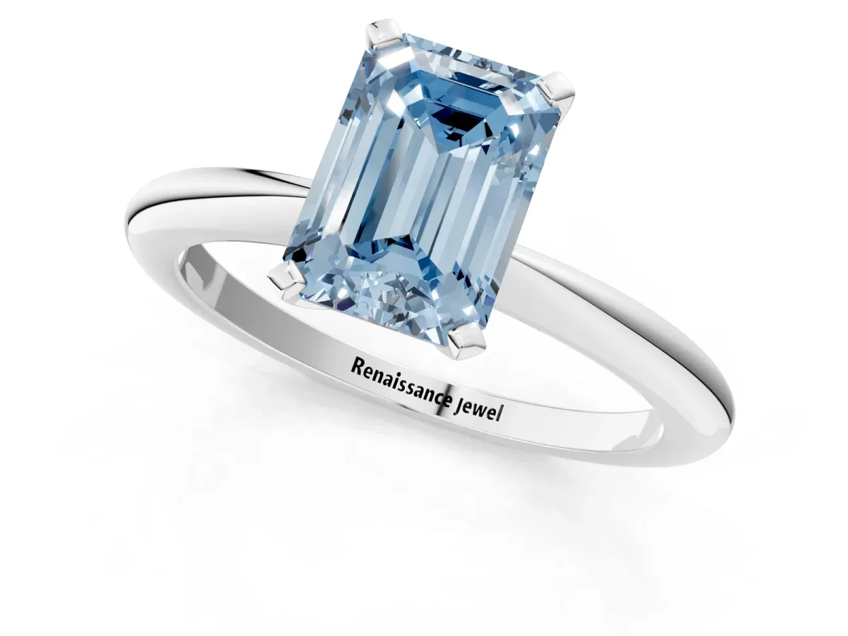 Fancy Blue Emerald Cut Diamond Solitaire Ring with Six-Prong Setting and Classic Band Platinum