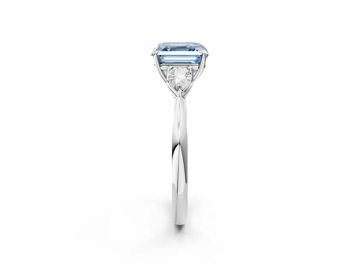 Fancy Blue Three-Stone Asscher Cut Diamond Ring with Pear Side Stones in Four-Prong Setting Platinum