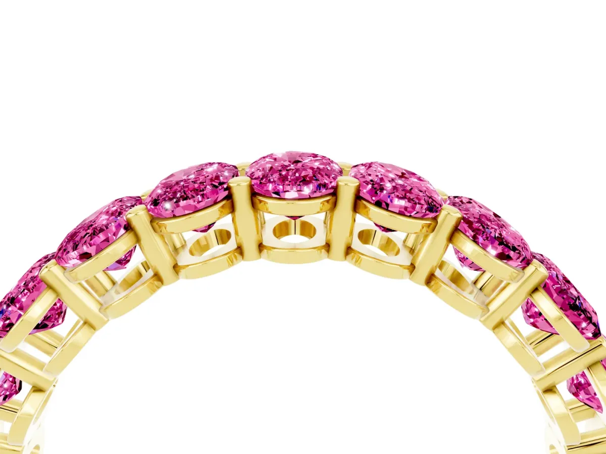 Oval Cut Pink Sapphire Eternity Band with Shared Prong Setting Yellow gold