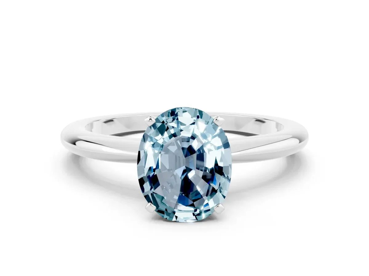 Oval Cut Aquamarine Solitaire Ring with Six-Prong Setting and Classic Band Silver
