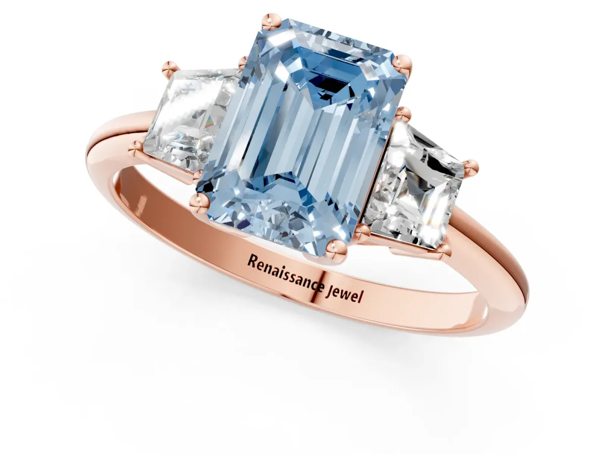 Fancy Blue Emerald Cut Diamond Three-Stone Ring with Trapezoid Side Stones and Prong Setting Rose gold