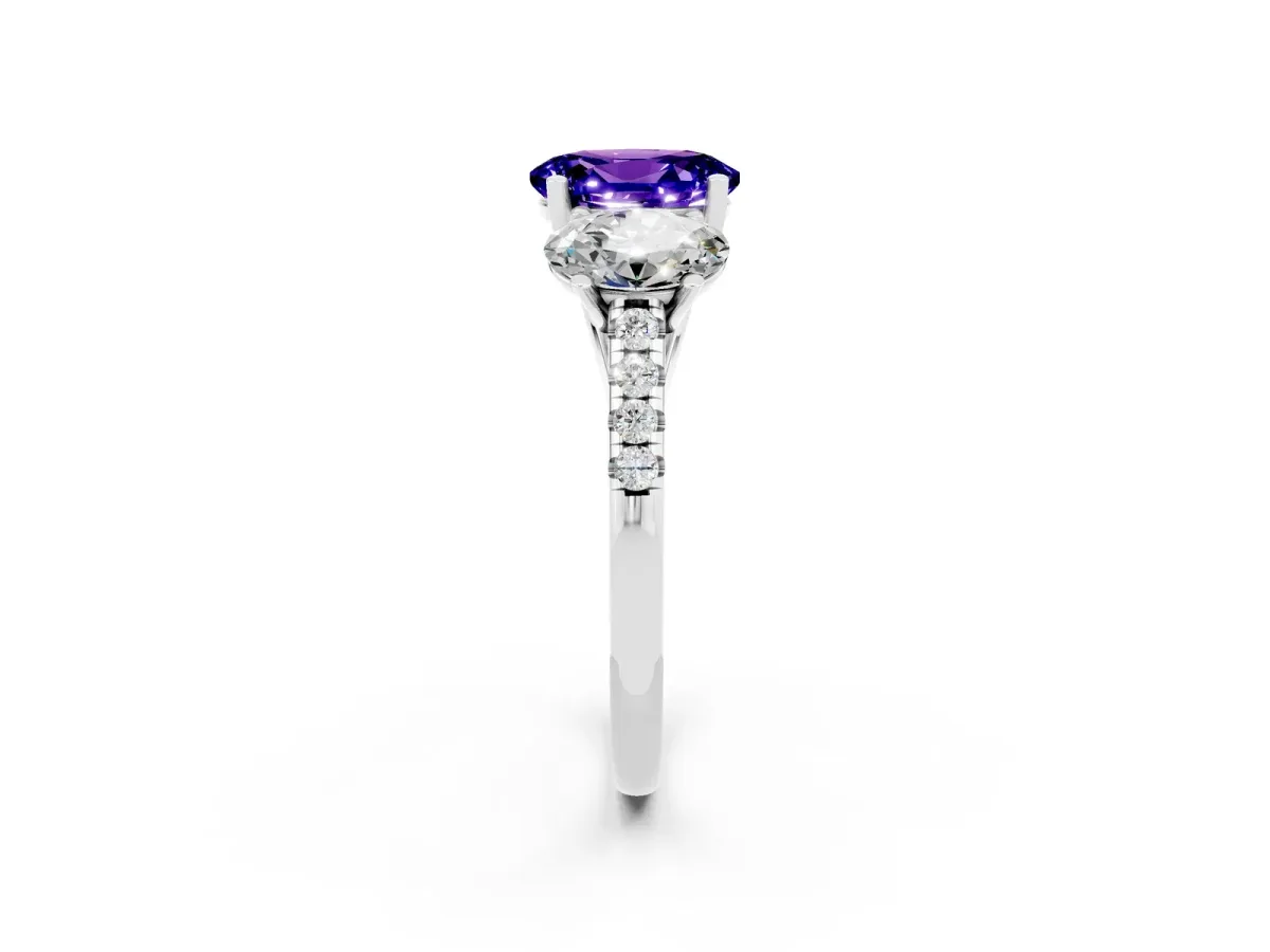 Three-Stone Oval Cut Tanzanite Ring with Round Pavé Band and Prong Setting Platinum
