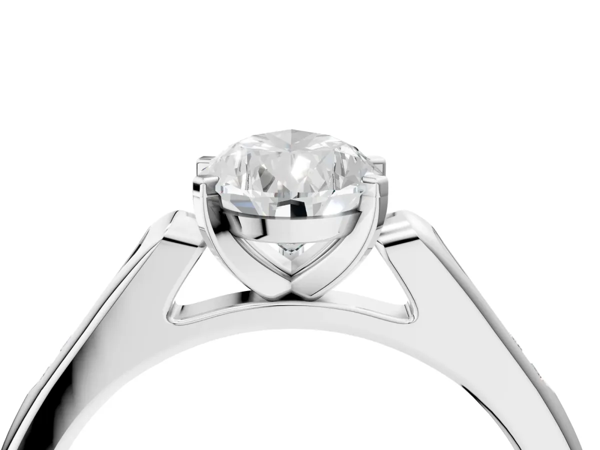 Pear Cut Diamond Solitaire Ring with Channel Set Round Band and Prong Setting Silver