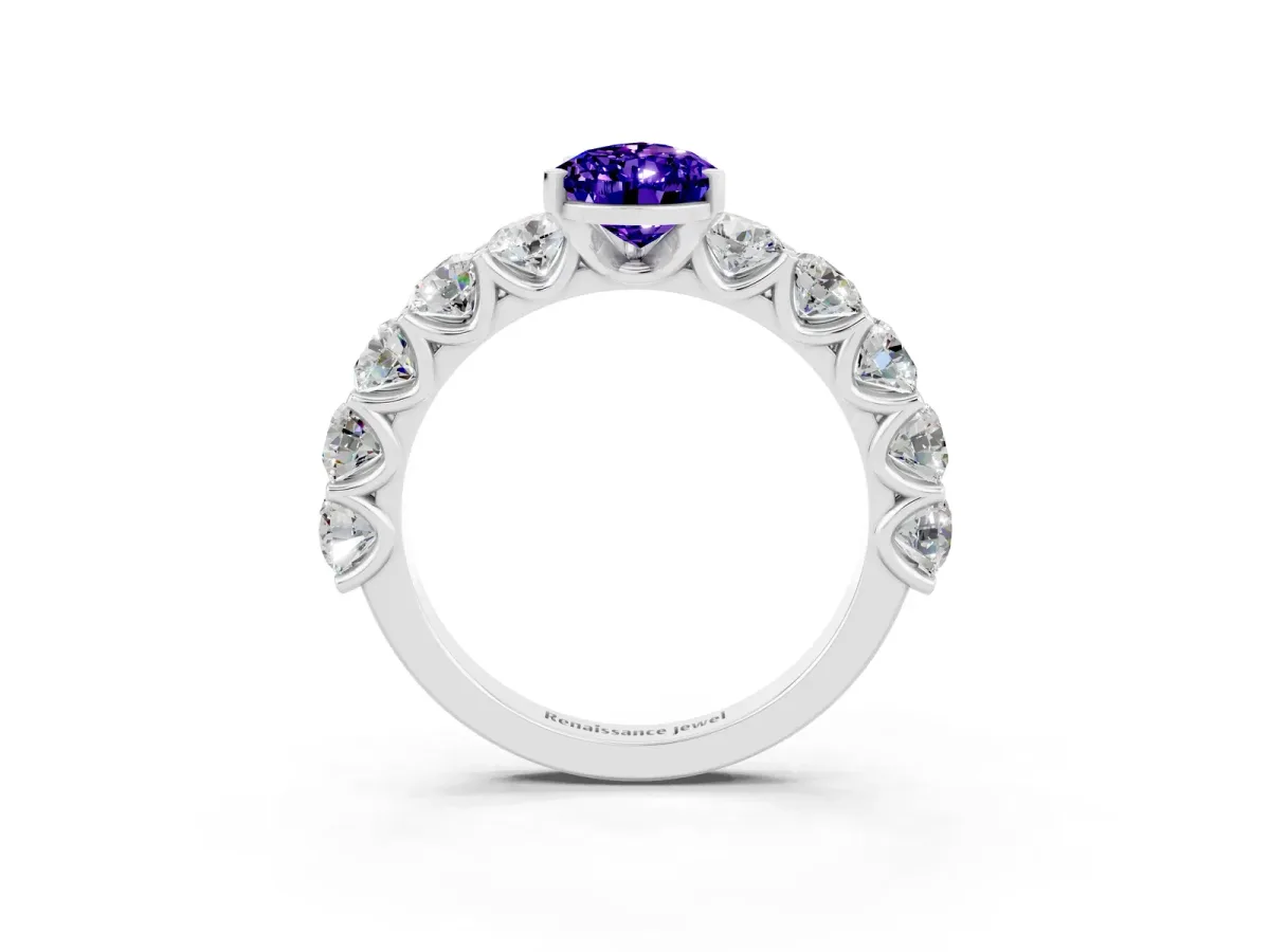 Pear Cut Tanzanite Prong Setting with Side Stones on a Pave Band Platinum