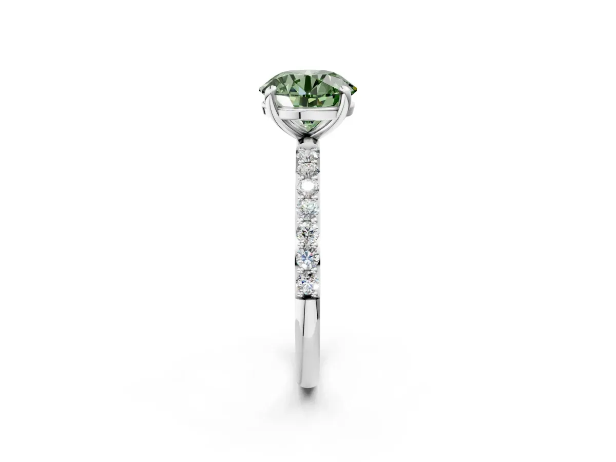 Fancy Green Round Cut Diamond Solitaire Ring with Round Pavé Band and Prong Setting Silver