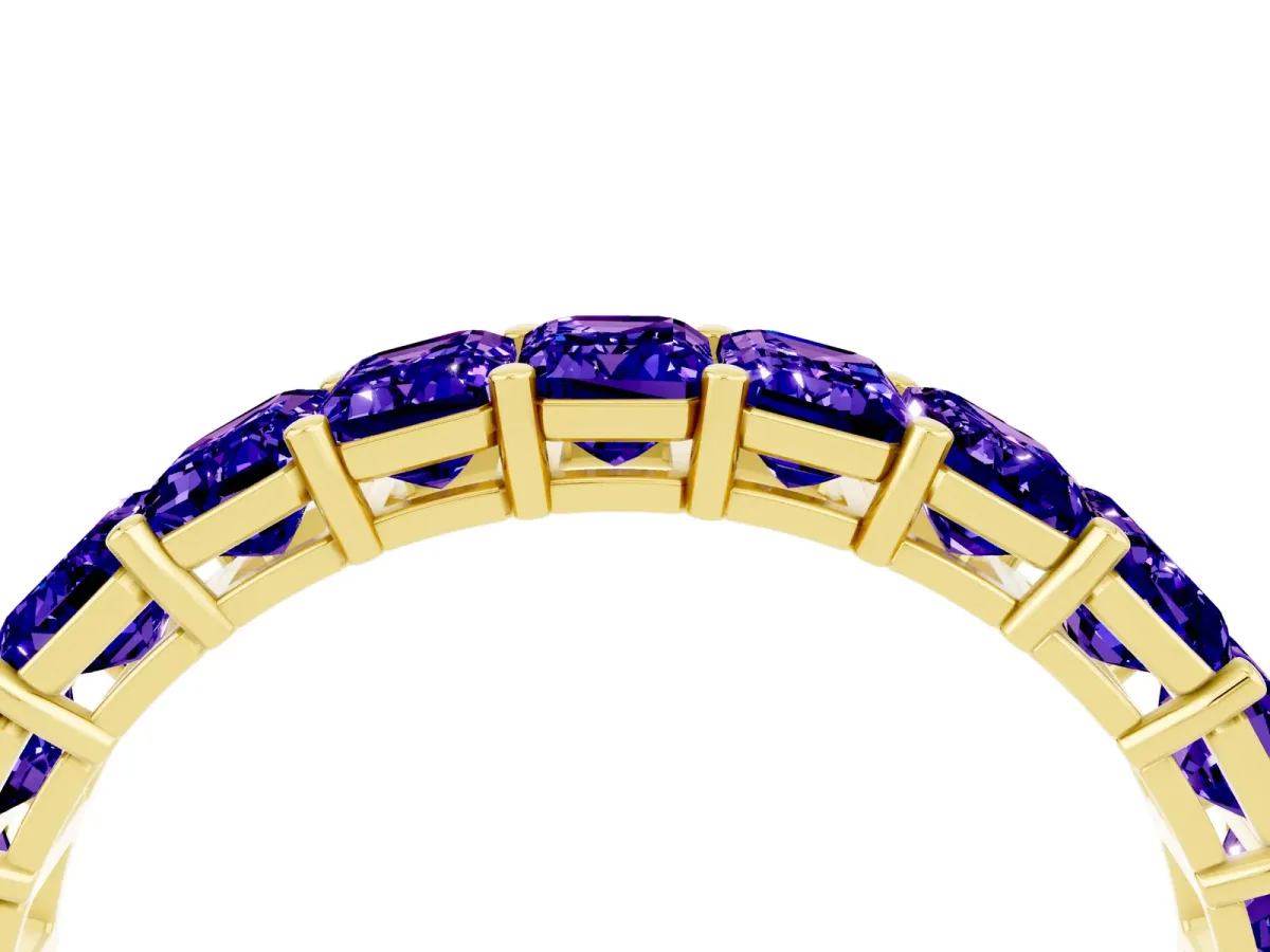 Emerald Cut Tanzanite Eternity Band with Shared Prong Setting Yellow gold