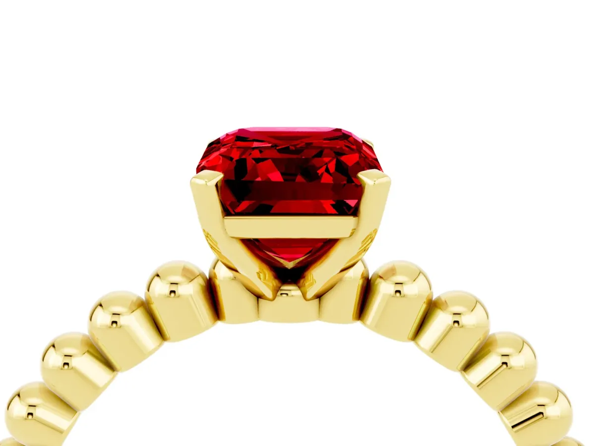 Emerald Cut Ruby Solitaire Ring with Beaded Band and Prong Setting Yellow gold