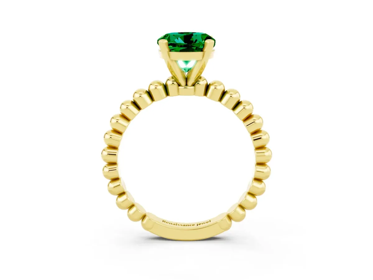 Round Cut Emerald Solitaire Ring with Beaded Band and Prong Setting Yellow gold