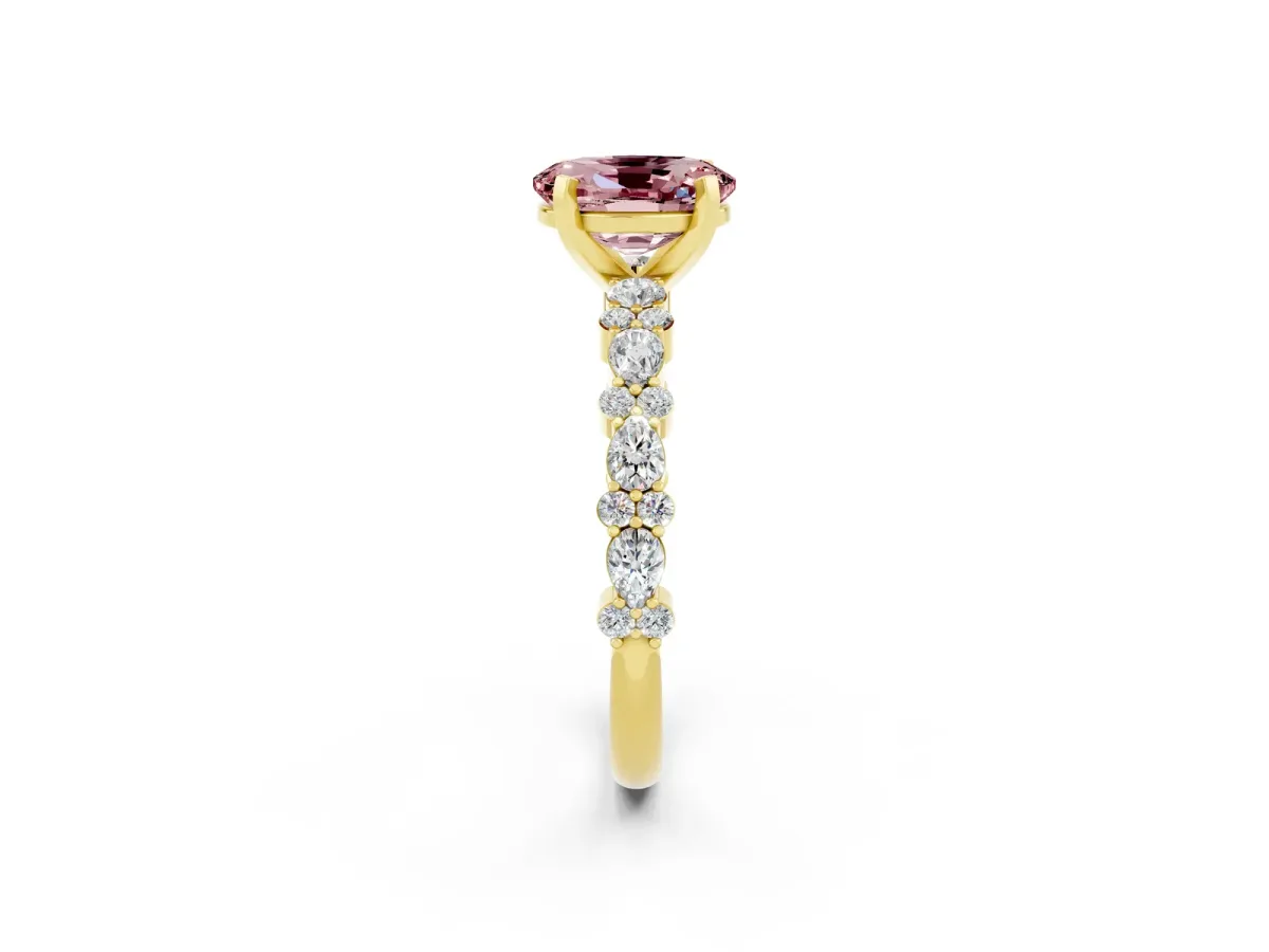 Oval Cut Morganite Side Stone Solitaire Ring with Round and Four-Prong Setting Yellow gold