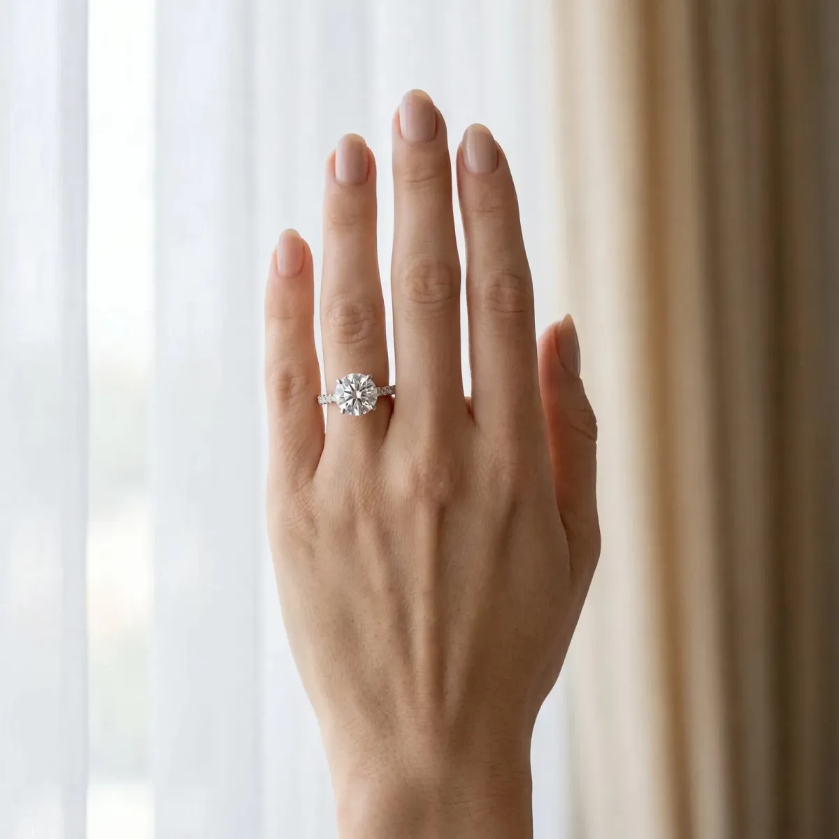 Round Cut Diamond Solitaire Ring with Round Pavé Band and Four-Prong Setting Platinum