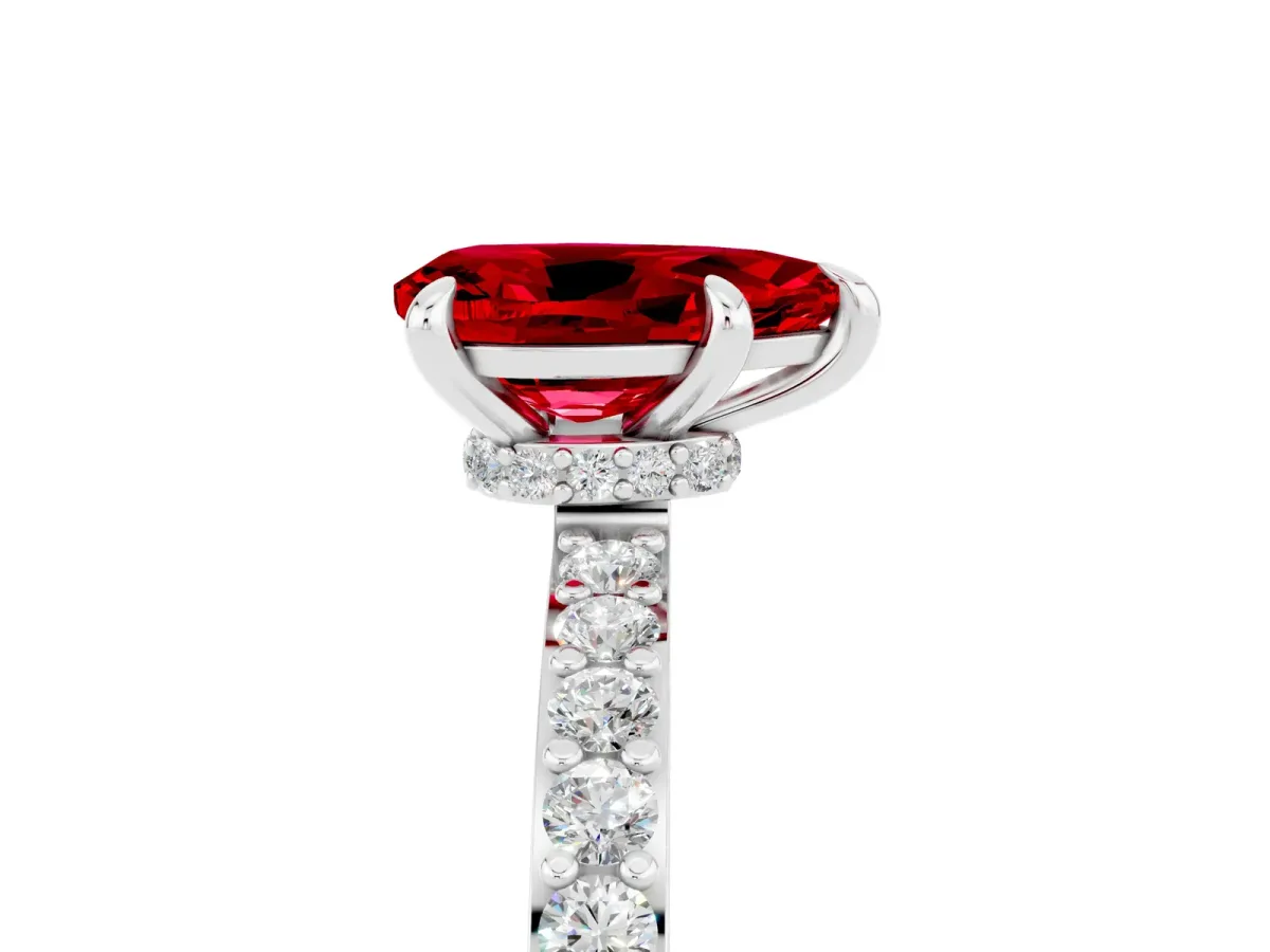 Pear Cut Ruby Solitaire Engagement Ring with Pavé Band and Four-Prong Setting White gold