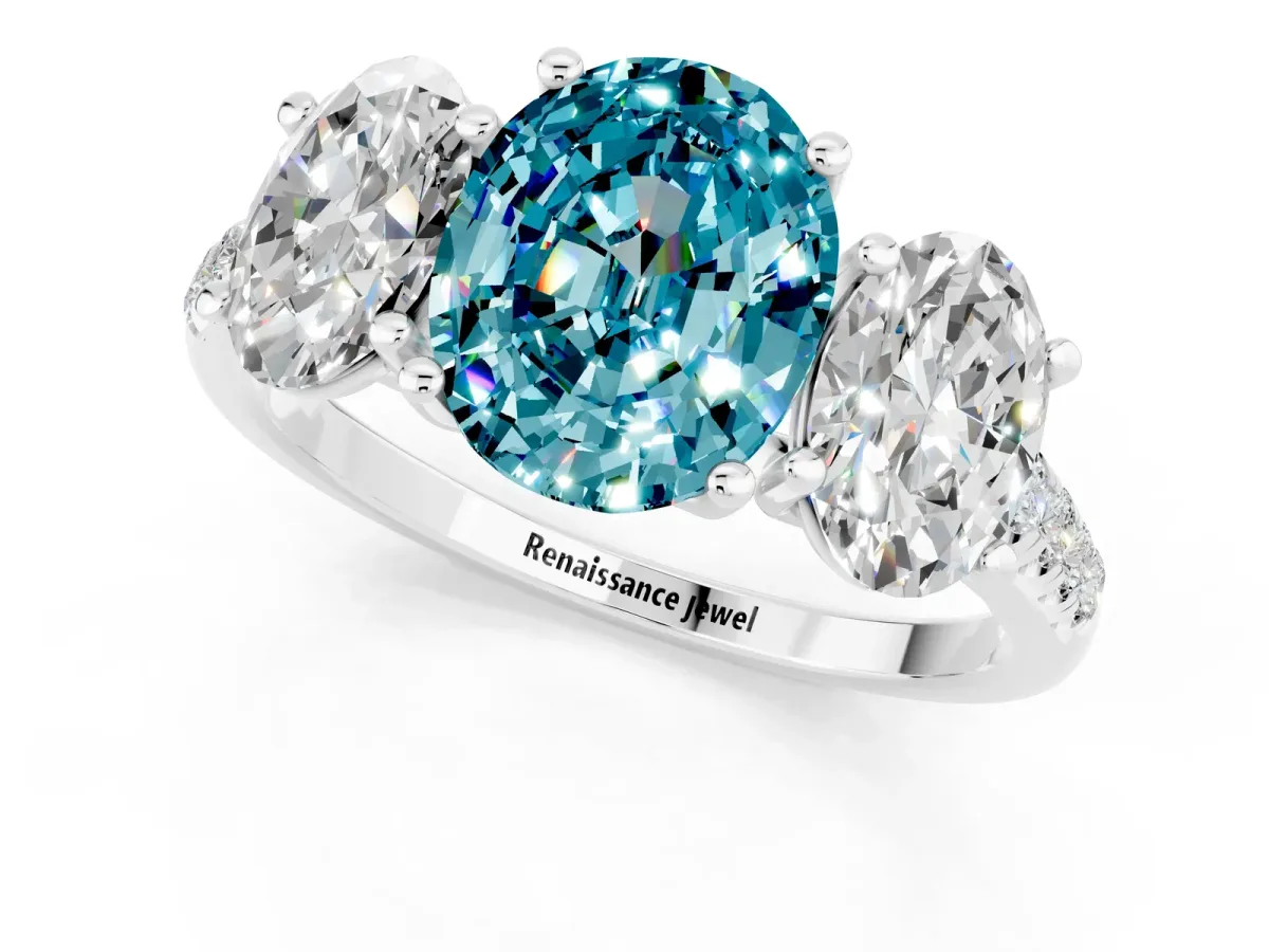 Three-Stone Oval Cut Blue Topaz Ring with Round Pavé Band and Prong Setting Platinum