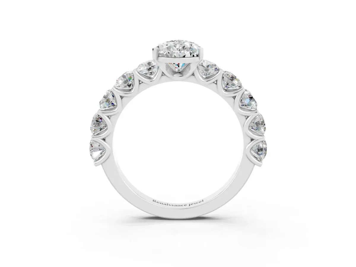 Pear Cut Moissanite Prong Setting with Side Stones on a Pave Band Silver