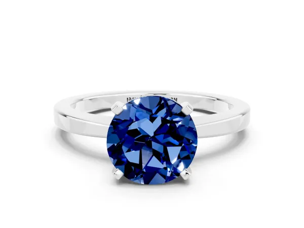 Round Cut Blue Sapphire Solitaire Engagement Ring with Classic Band and Four-Prong Setting Platinum