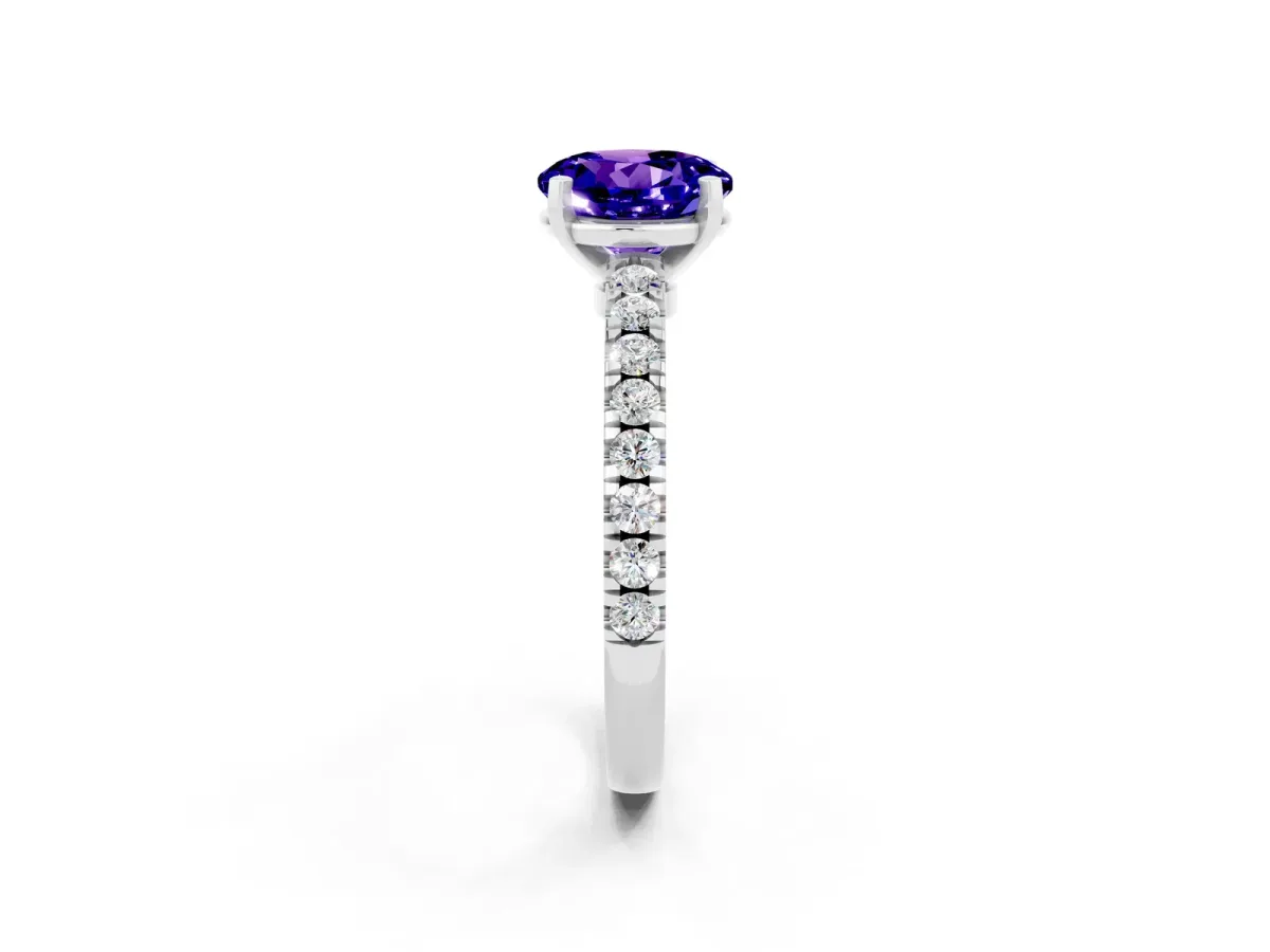 Round Cut Solitaire Tanzanite with Pavé Band and Four-Prong Setting Silver