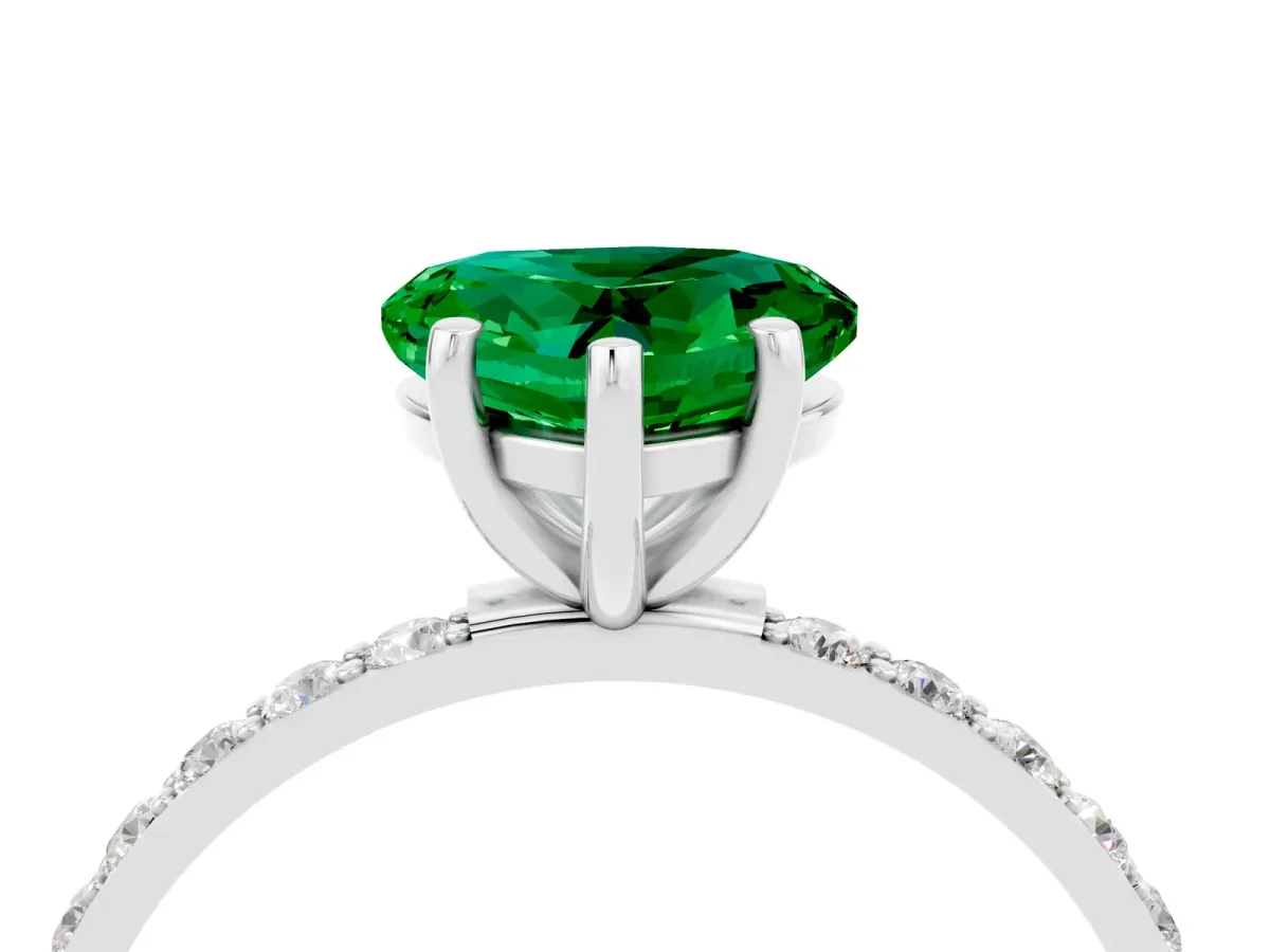 Heart Cut Emerald Solitaire Ring with Round Pavé Band and Prong Setting Platinum