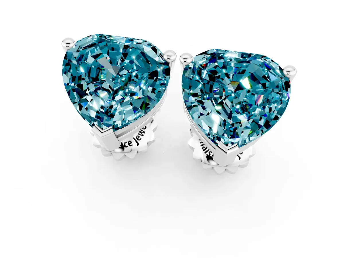 Heart Cut Blue Topaz Stud Earrings Platinum