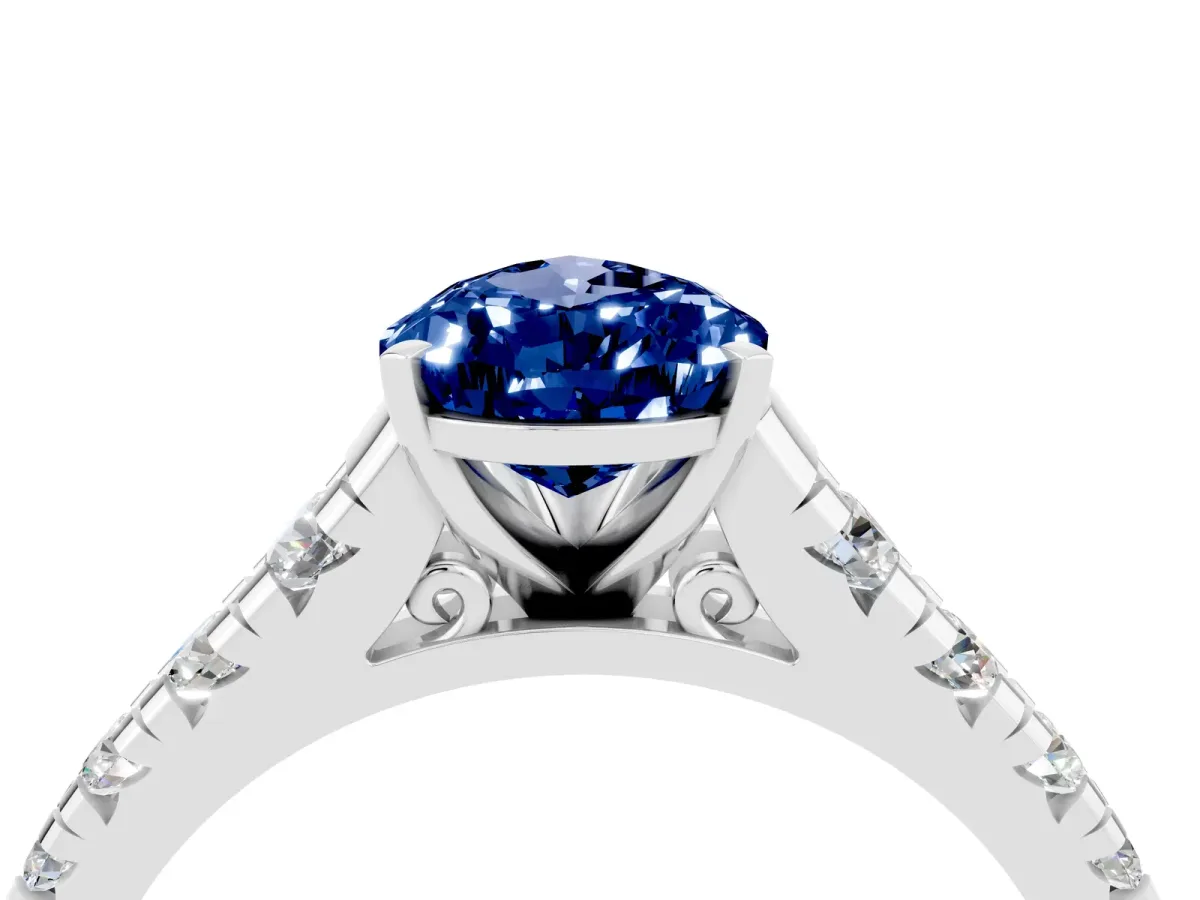 Pear Cut Blue Sapphire Cathedral Solitaire Ring with Round Pavé Band Silver