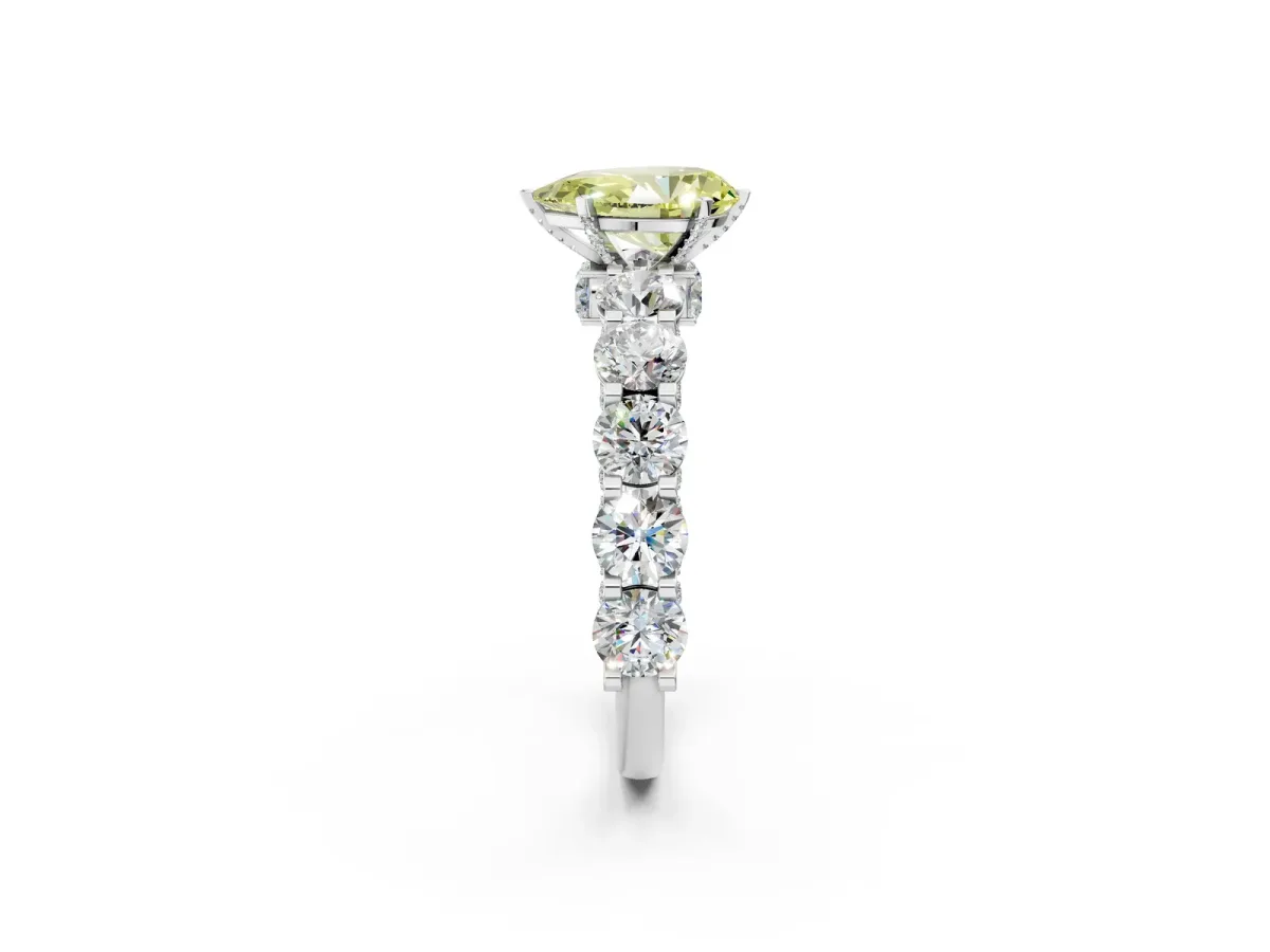 Fancy Yellow Pear Cut Diamond Side Stone Engagement Ring with Four-Prong Setting White gold