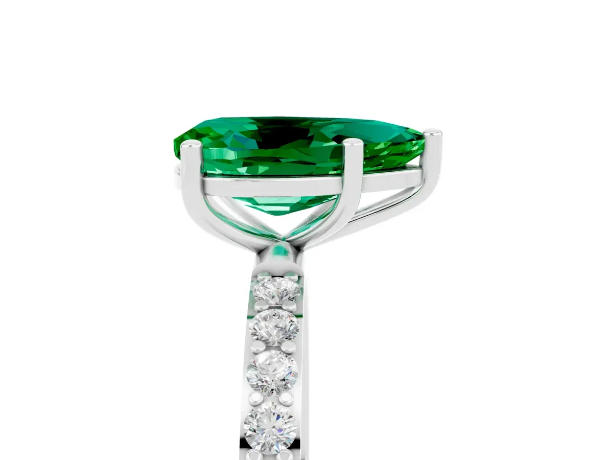 Pear Cut Emerald Solitaire Ring with Round Pavé Band and Prong Setting White gold