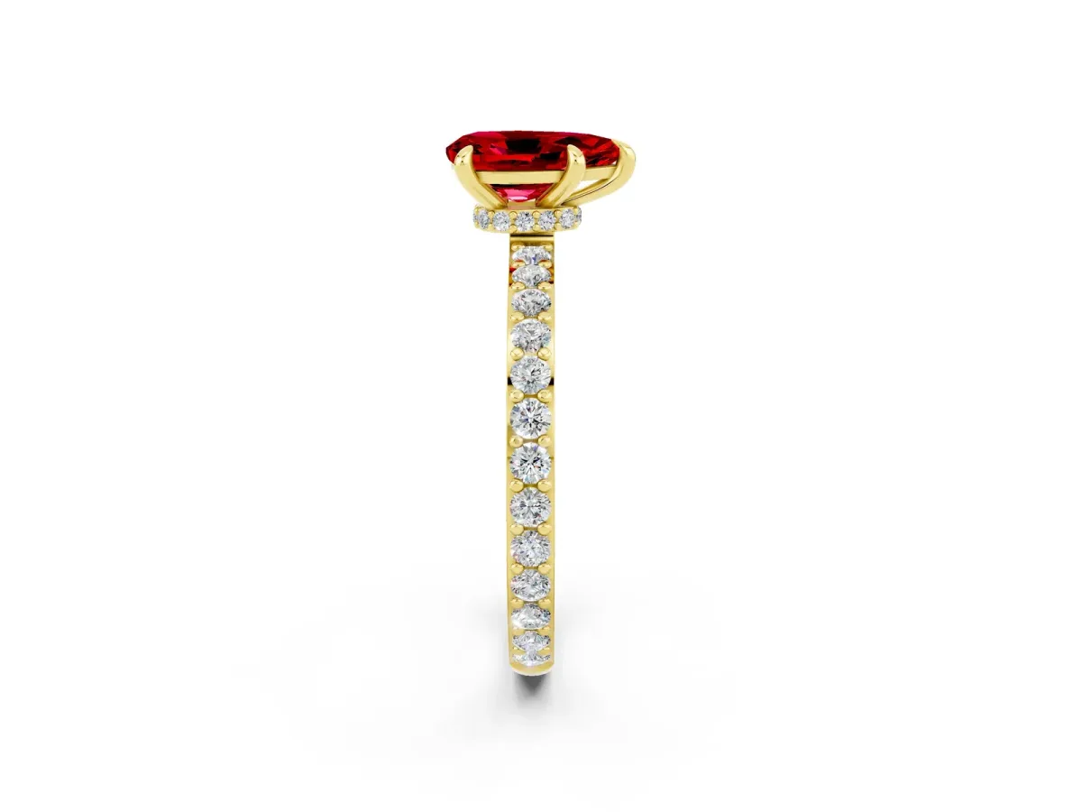 Pear Cut Ruby Solitaire Engagement Ring with Pavé Band and Four-Prong Setting Yellow gold