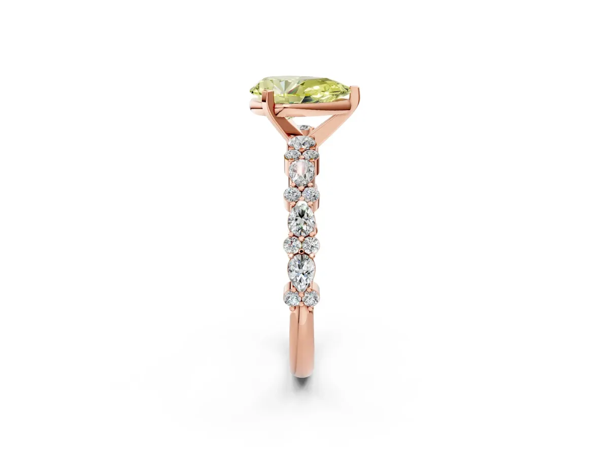 Fancy Yellow Pear Cut Diamond Side Stone Solitaire Ring with Round and Four-Prong Setting Rose gold