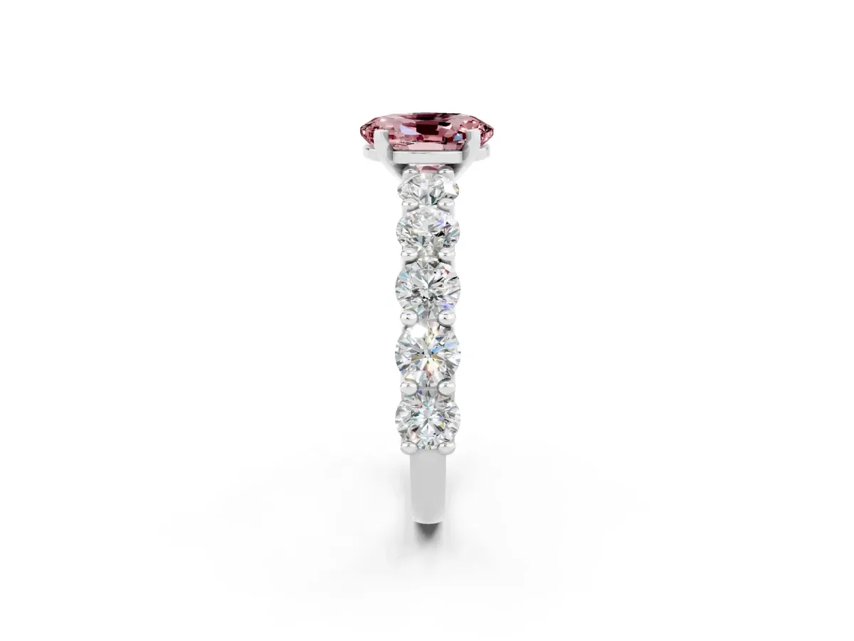 Oval Cut Morganite Prong Setting with Side Stones on a Pave Band Silver