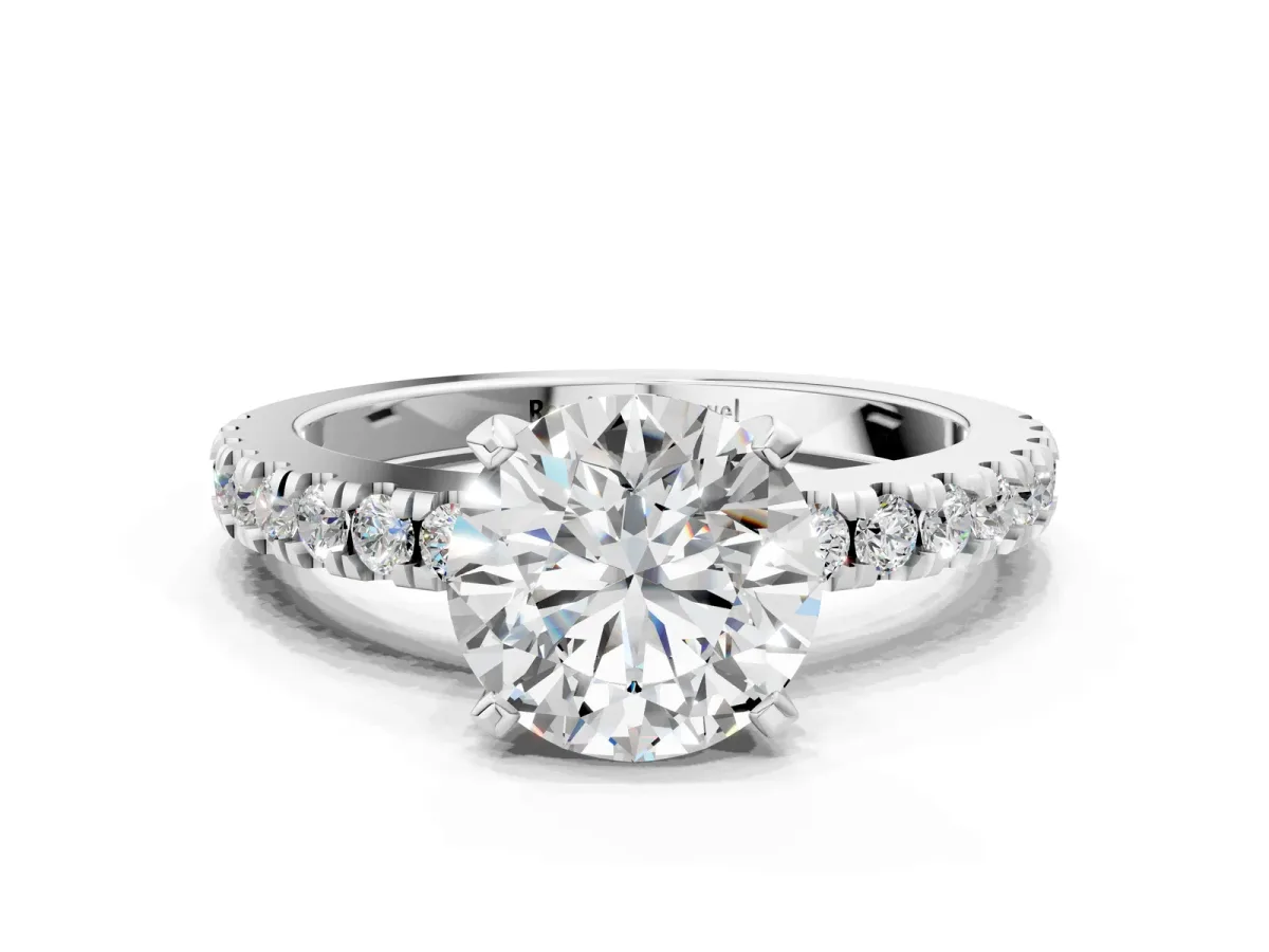 Round Cut Solitaire Diamond with Pavé Band and Four-Prong Setting Platinum