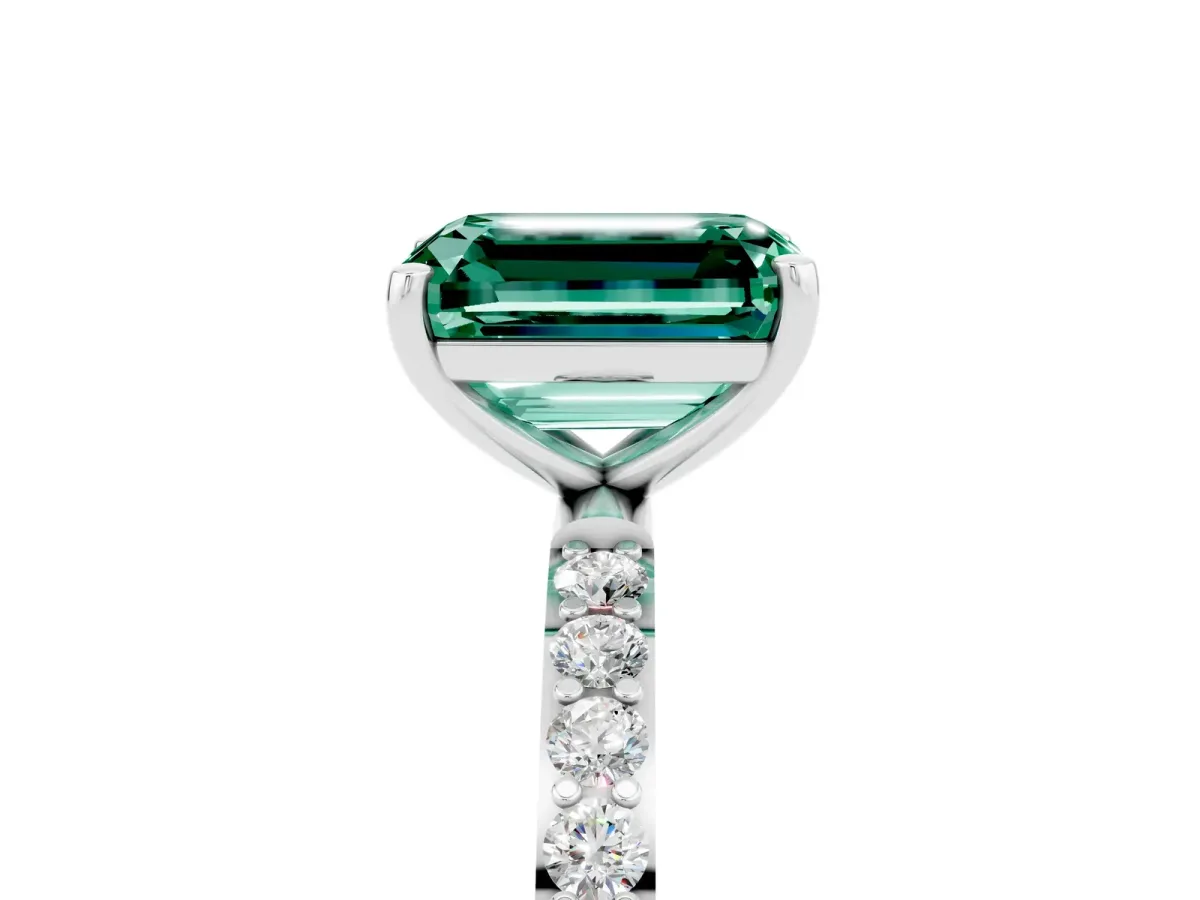 Emerald Cut Green Sapphire Solitaire Ring with Round Pavé Shoulders and Prong Setting Silver