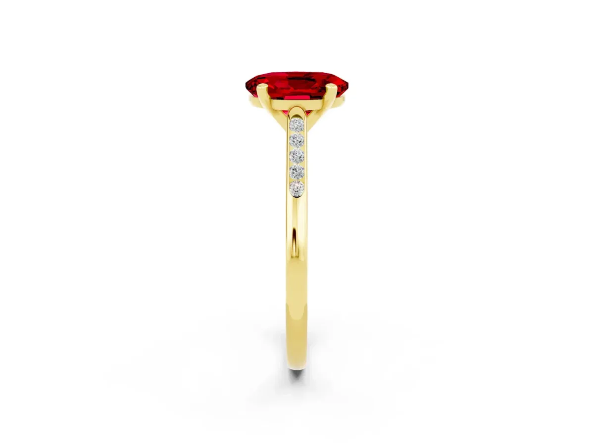 Oval Cut Ruby Solitaire Ring with Channel Set Round Band and Prong Setting Yellow gold