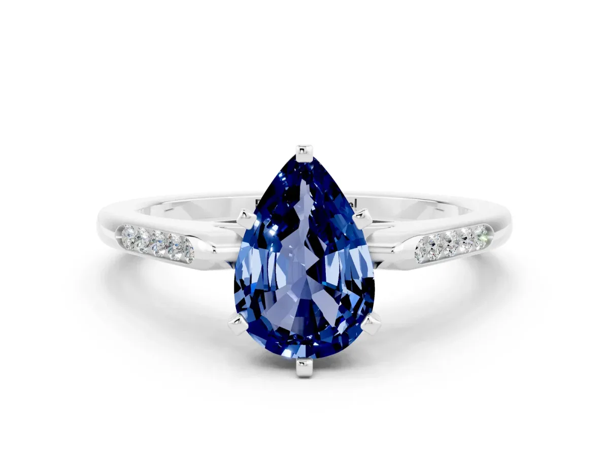 Pear Cut Blue Sapphire Solitaire Ring with Channel Set Round Band and Prong Setting Silver