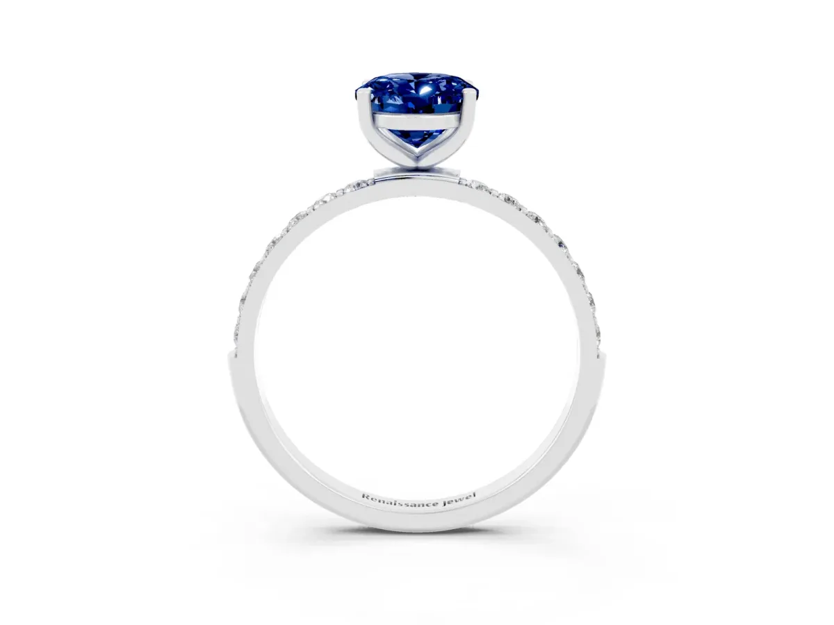 Oval Cut Blue Sapphire Solitaire Ring with Round Pavé Band and Prong Setting Silver