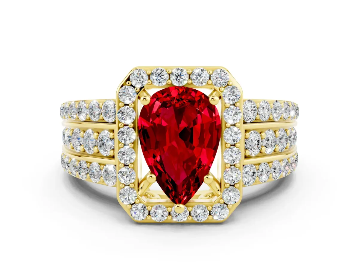 Pear Cut Halo Ruby Ring with Round Split Shank and Prong Setting Yellow gold