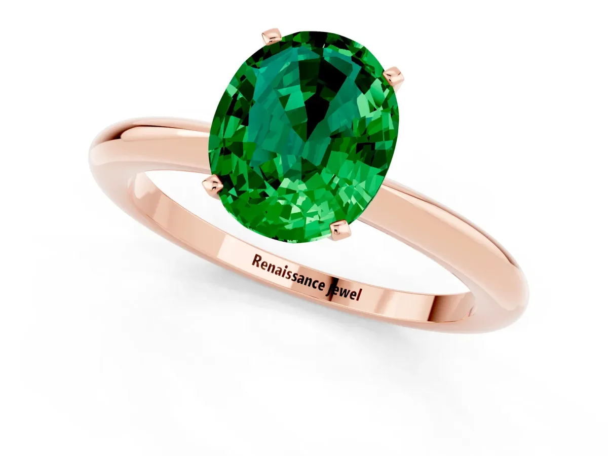 Oval Cut Emerald Solitaire Ring with Six-Prong Setting and Classic Band Rose gold
