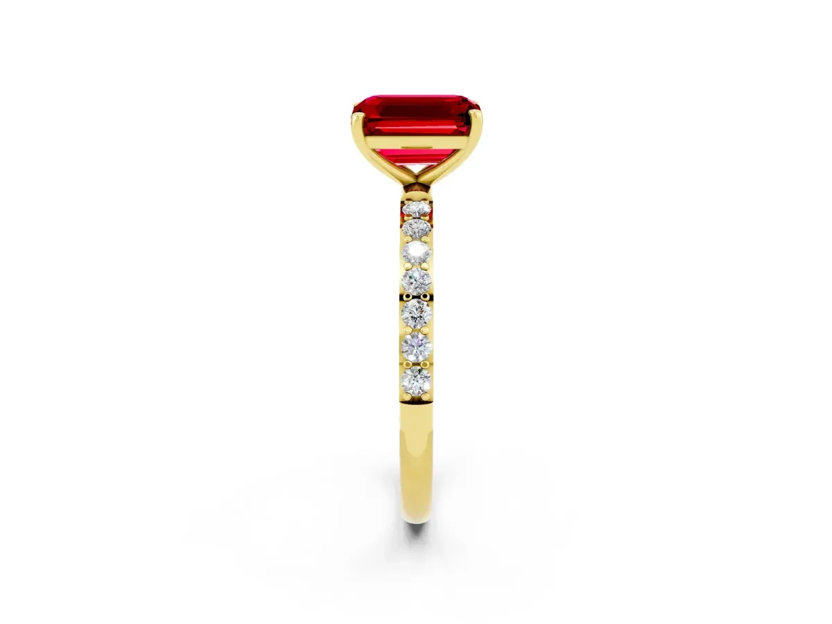 Emerald Cut Ruby Solitaire Ring with Round Pavé Band and Prong Setting Yellow gold