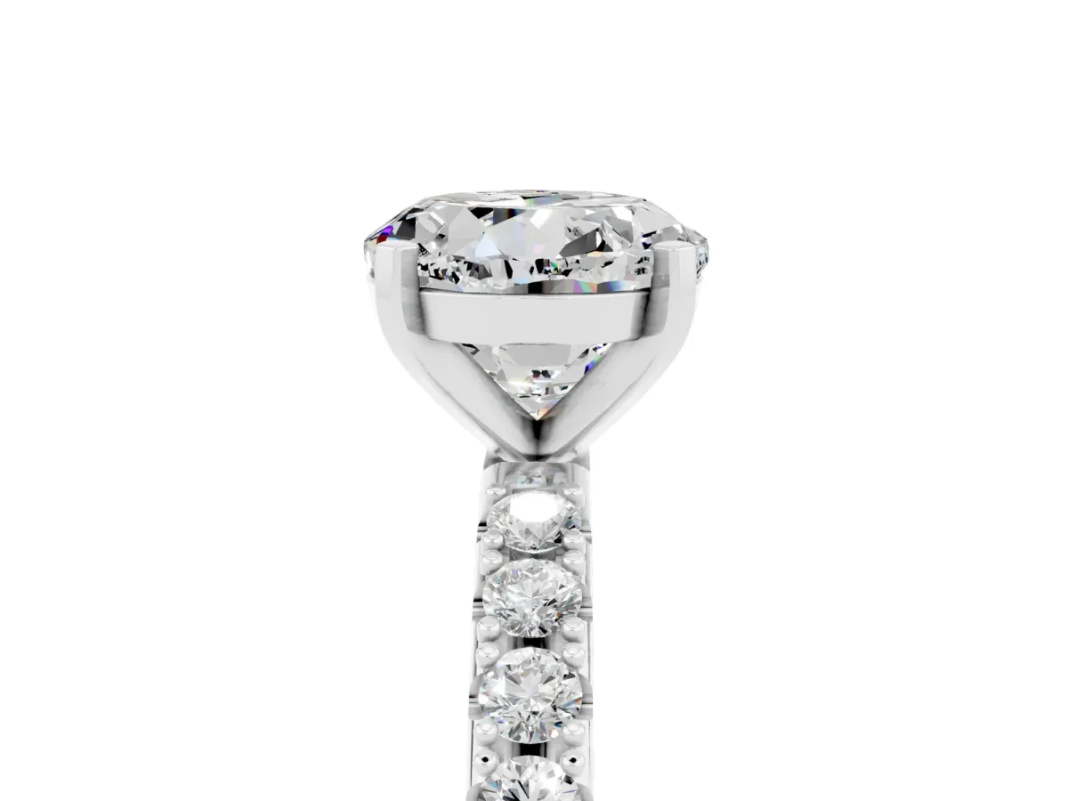 Round Cut Moissanite Solitaire Pavé Band with Four-Prong Setting Silver