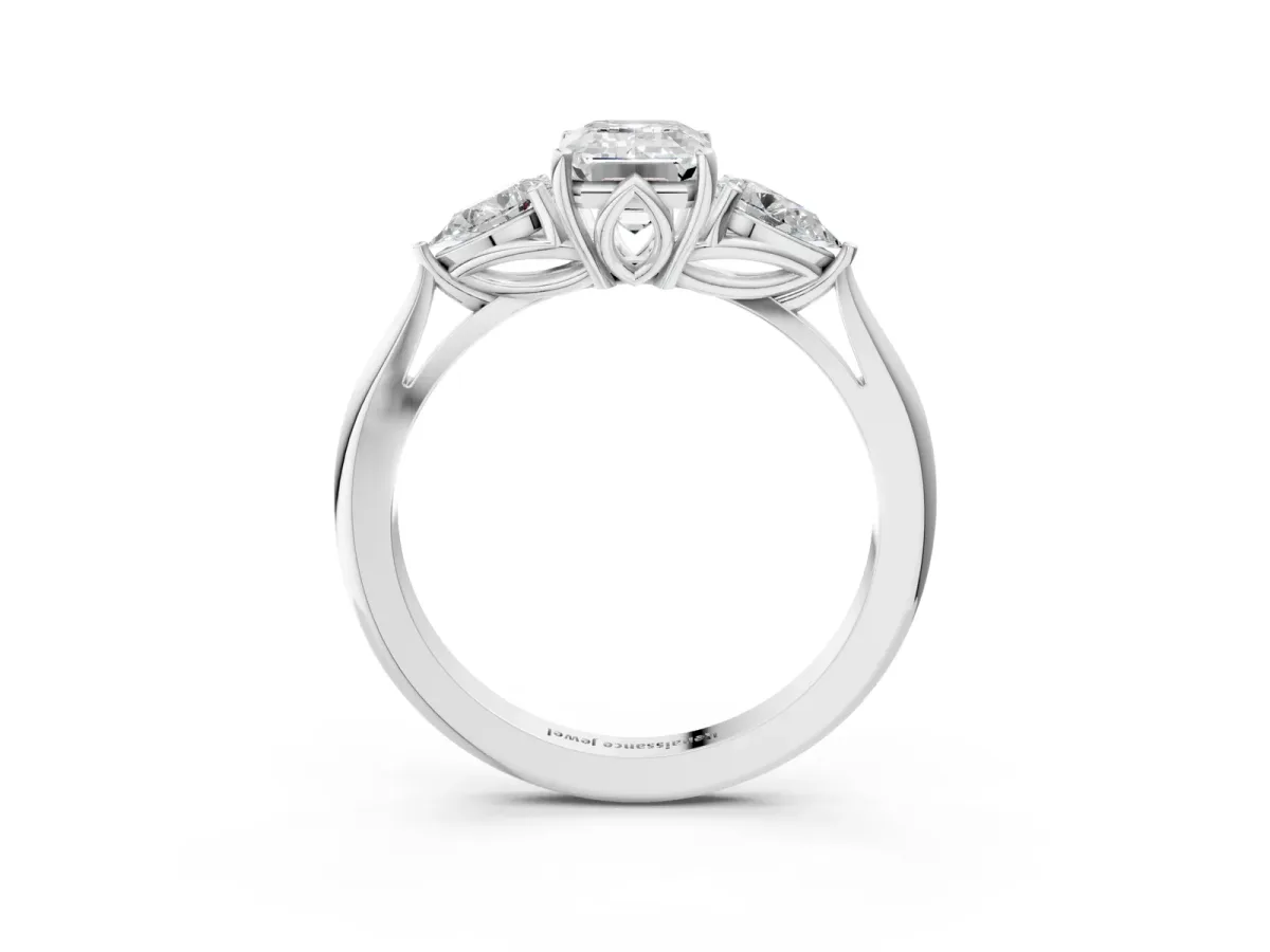 Three-Stone Emerald Cut Diamond Ring with Pear Side Stones in Four-Prong Setting White gold