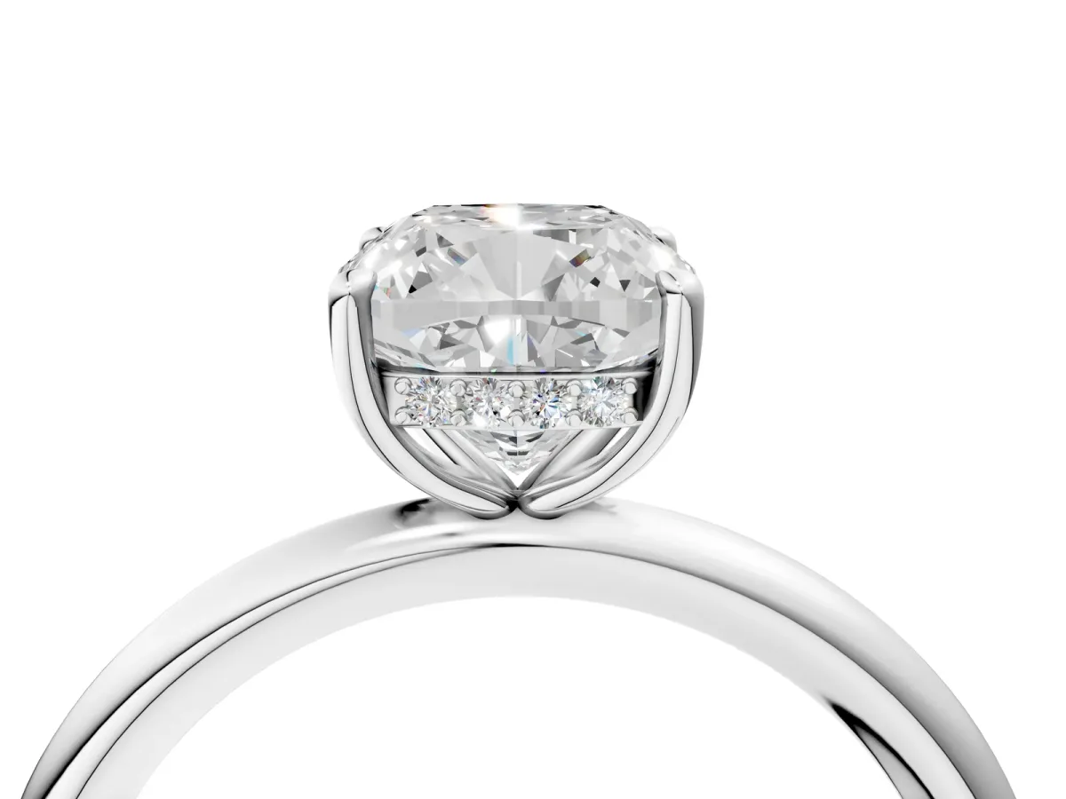 Cushion Cut Diamond Solitaire Ring with Thin Band and Four-Prong Setting White gold