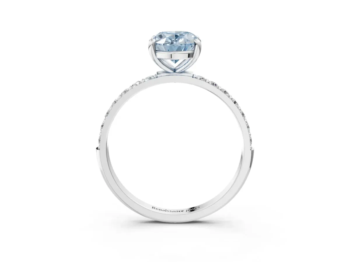 Fancy Blue Oval Cut Diamond Solitaire Ring with Round Pavé Band and Prong Setting Silver