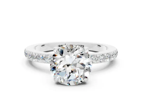 Round Cut Moissanite Solitaire Engagement Ring with Pavé Band and Four-Prong Setting Platinum
